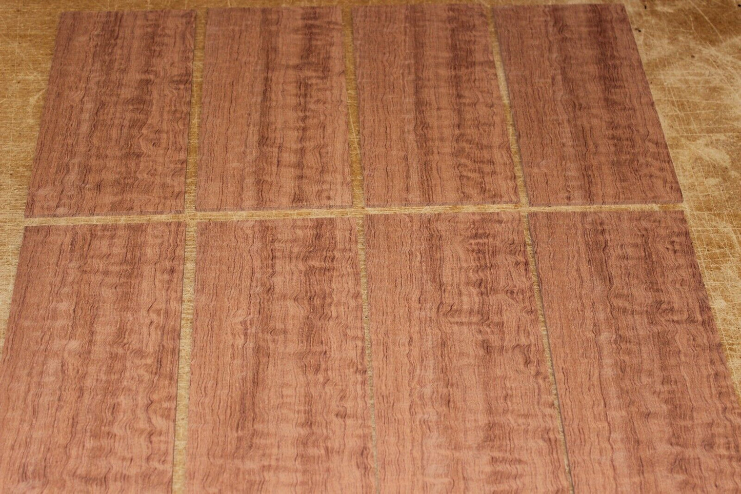 Quarter sawn figured bubinga headstock / peg head veneer. Sold individually