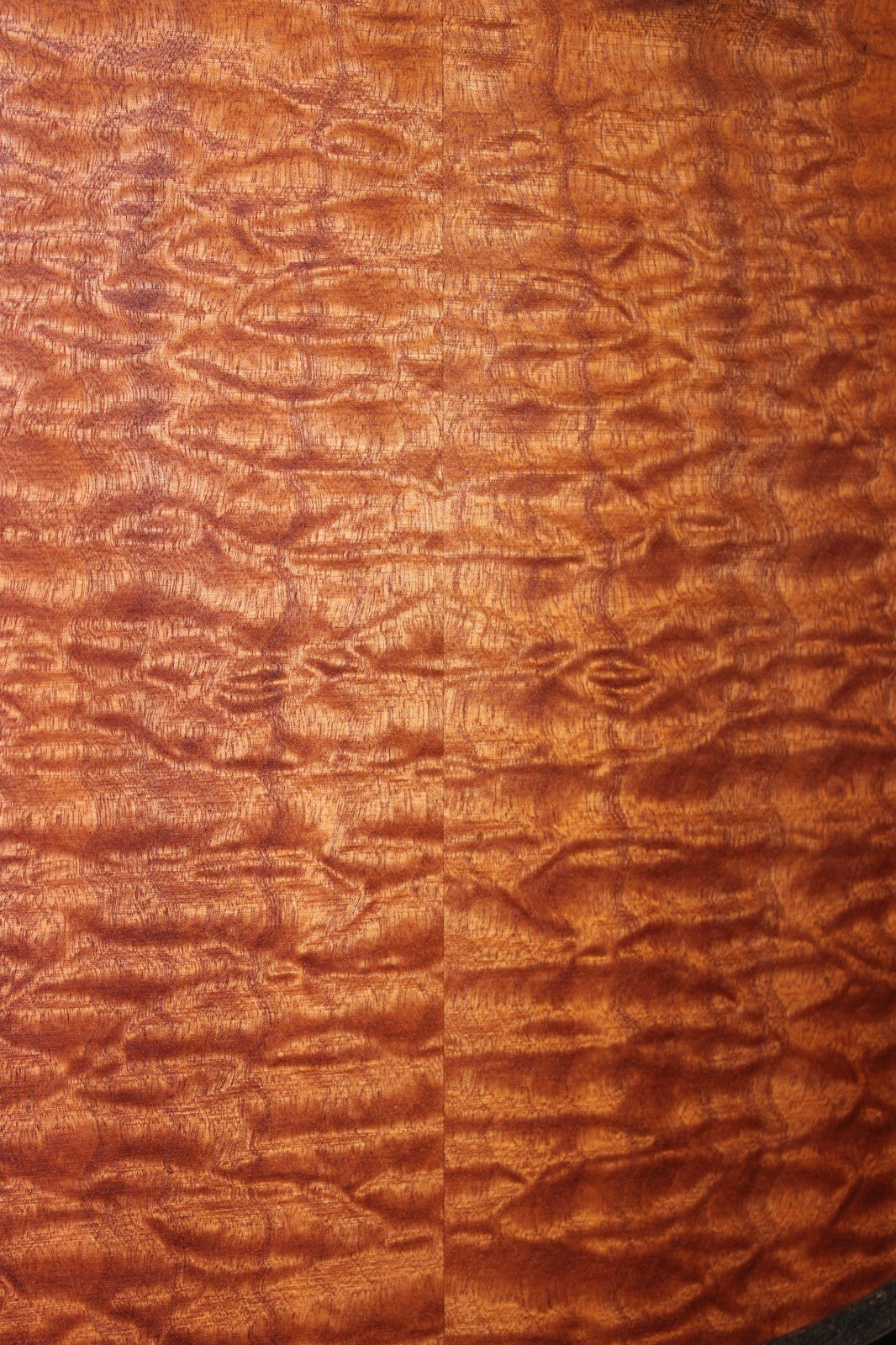 Quilted sapele electric guitar bookmatched drop top. Master grade figure.