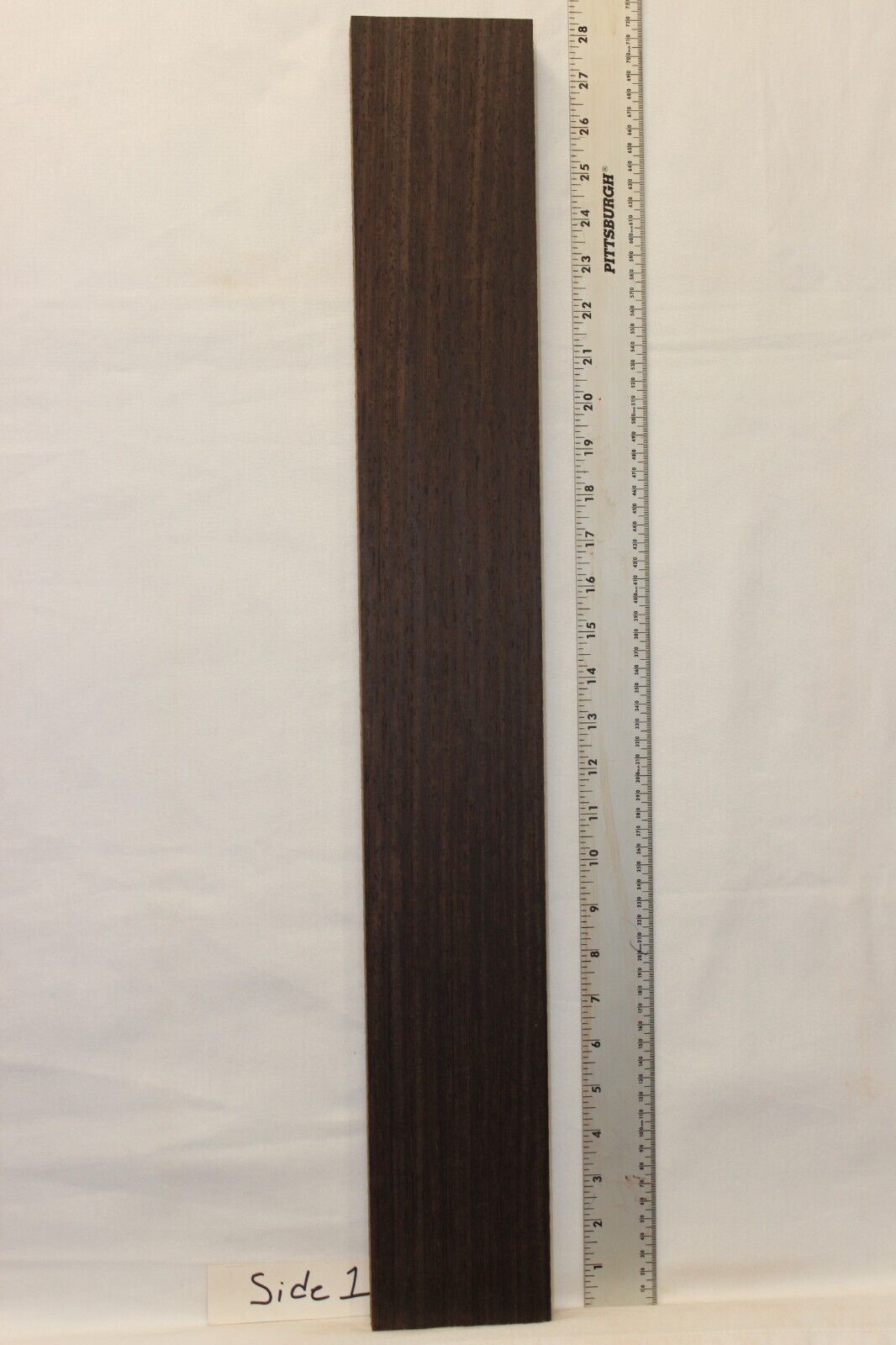 Wenge guitar neck blank. Nice straight vertical grain.