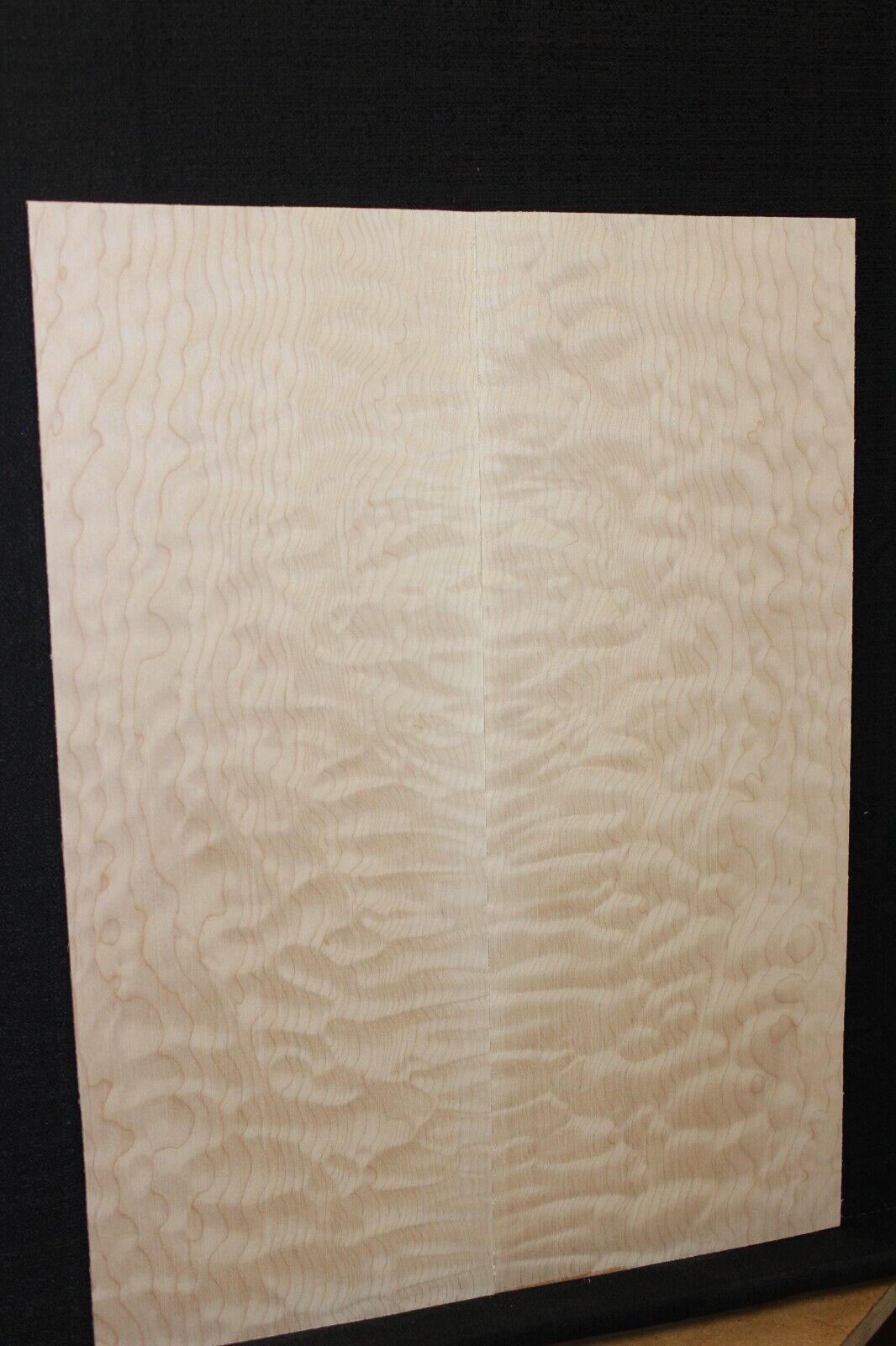Quilted maple book matched guitar drop top.