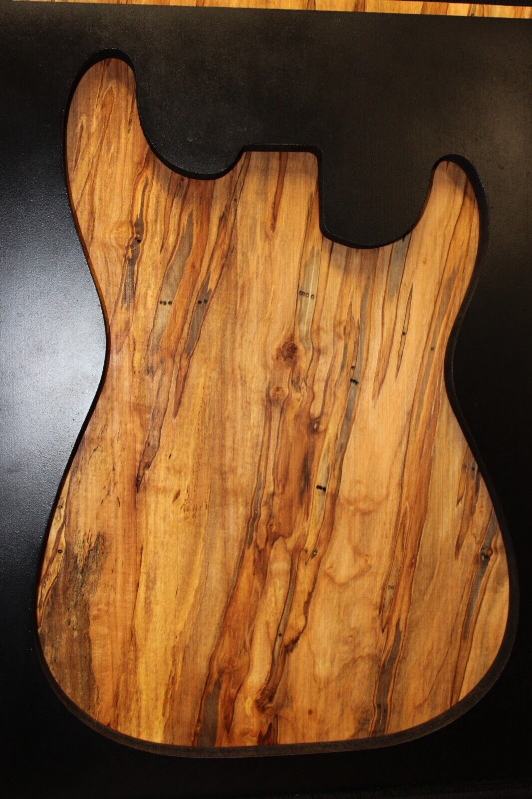 Spalted ambrosia maple one piece guitar top.