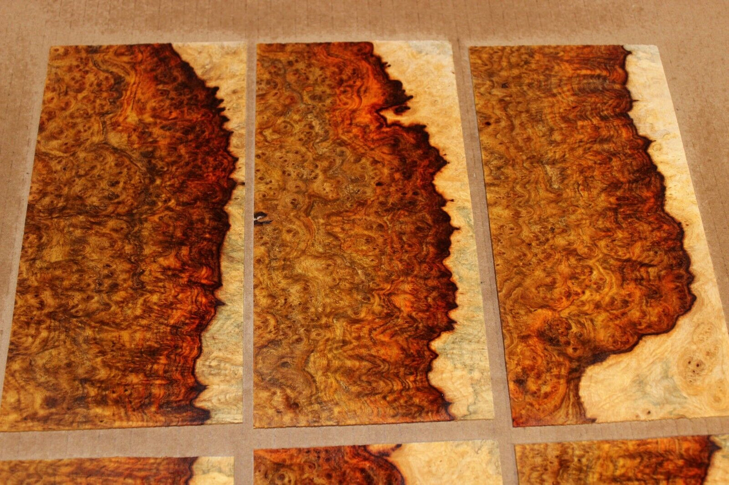 Amboyna burl headstock / peg head veneer. Sold individually