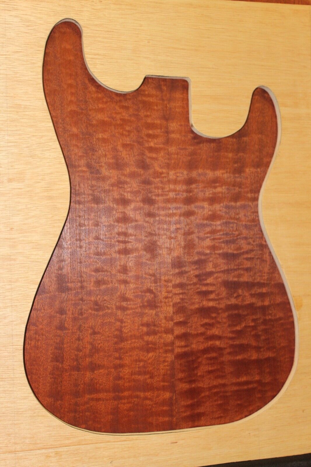 Figured sapele guitar bookmatched drop top.