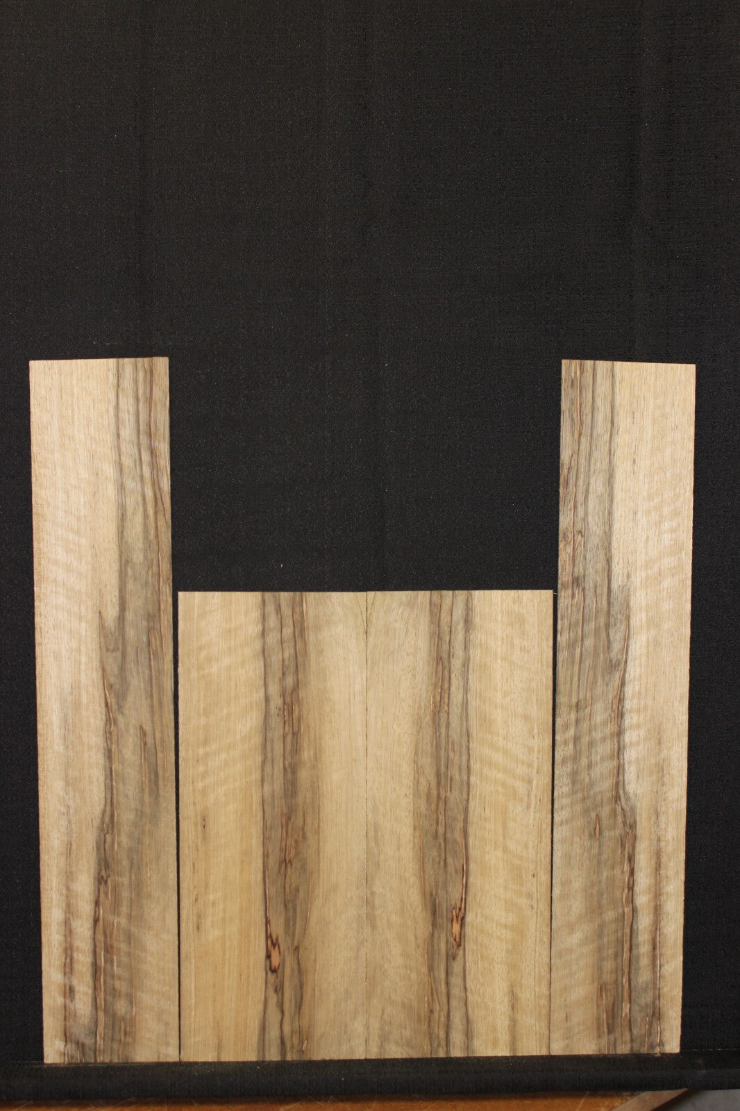 Quarter sawn black limba / korina ukulele back and side set. Tenor size