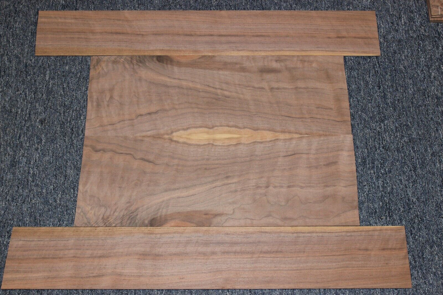 Flame figured black walnut dreadnought size guitar back and side set.