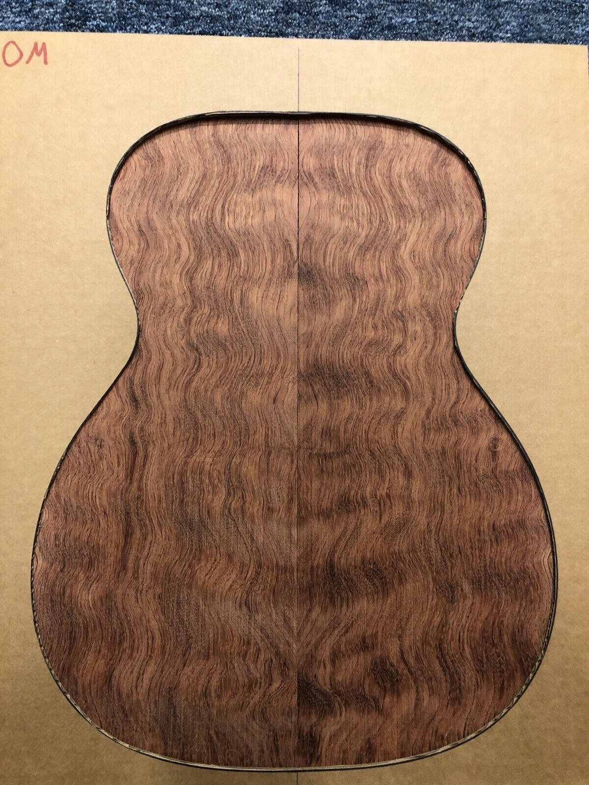 Waterfall figured bubinga back and side set. Stunning grain, color and figure.