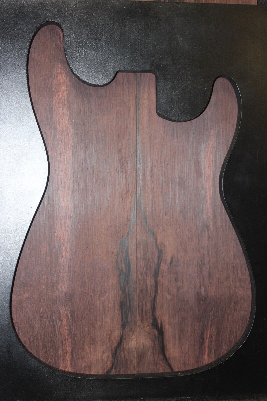 Madagascar rosewood guitar drop top.