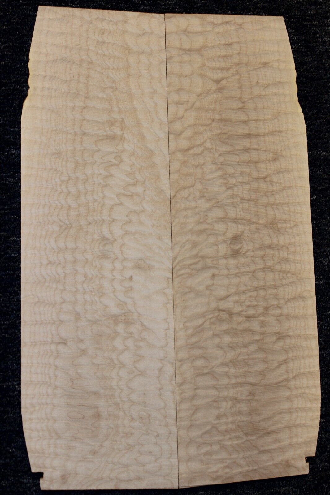 Quilted maple book matched guitar drop top. 5A figure