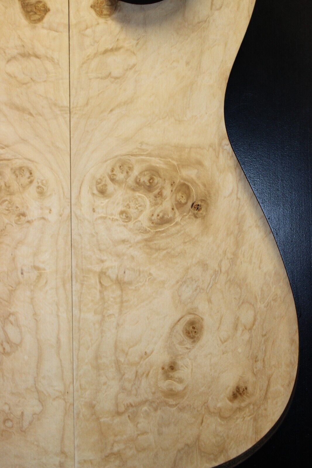Silver maple, burl / lace figured guitar book matched top.