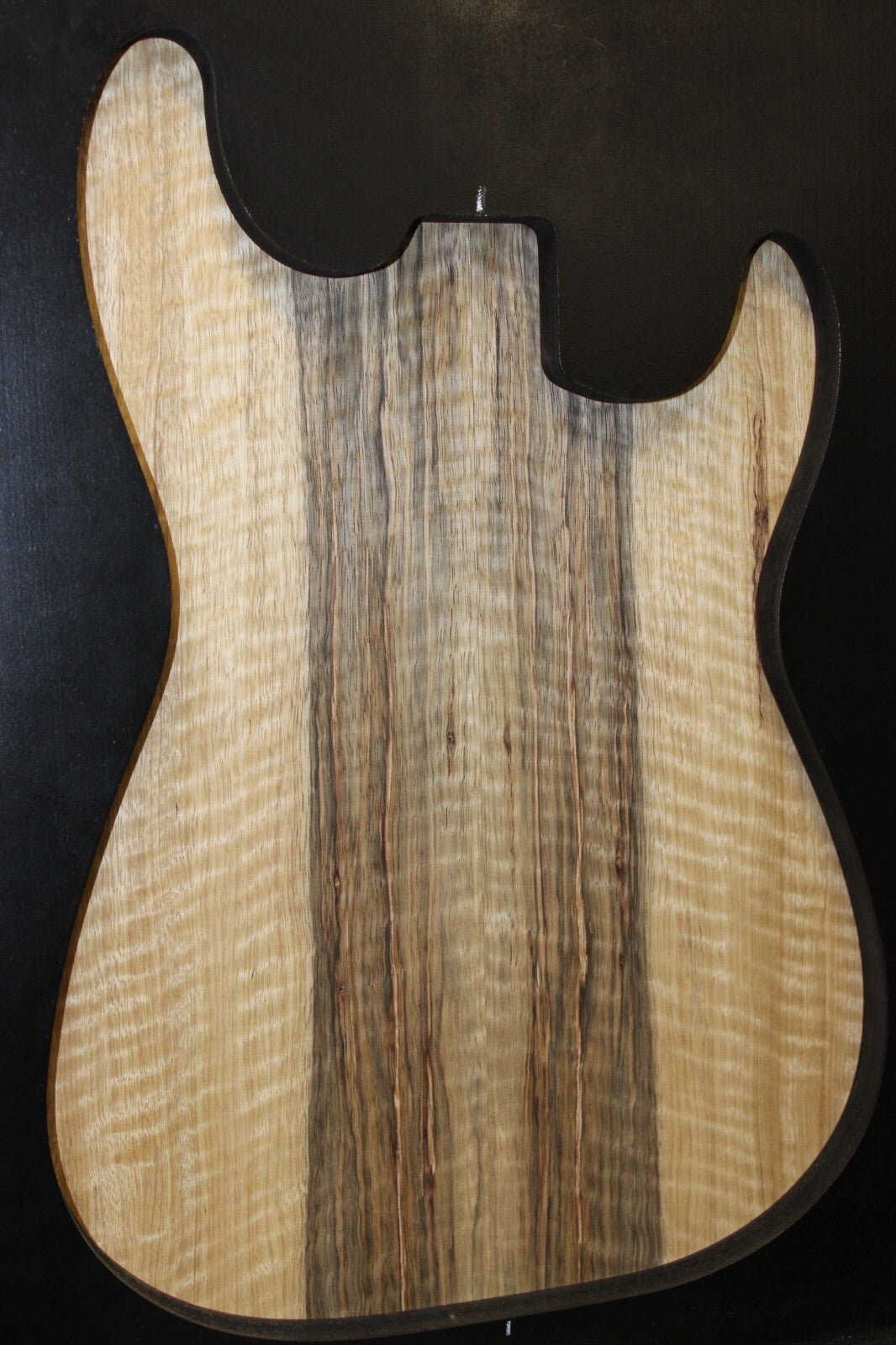 Curly black limba / korina figured book matched guitar top. 0.37" thick