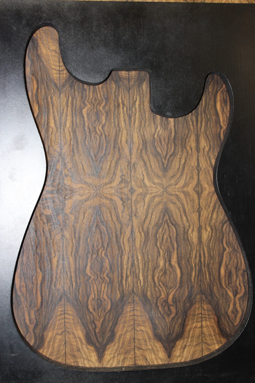 Multi book match black limba END GRAIN electric guitar top.