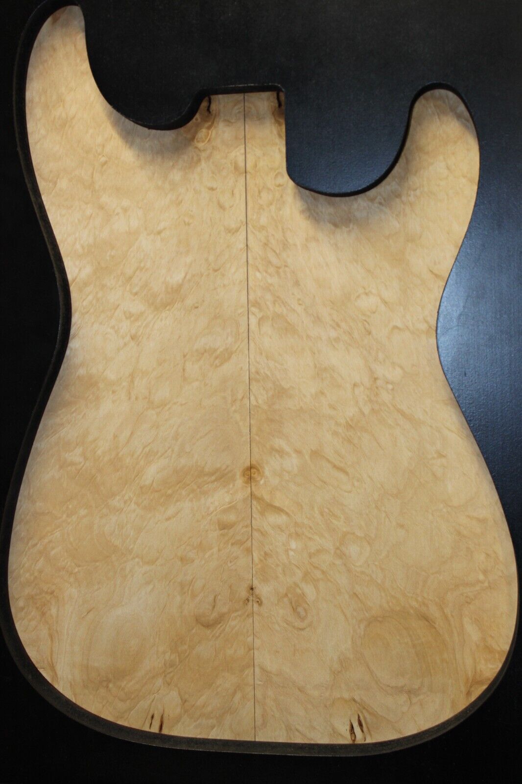 Silver maple, burl / lace figured guitar book matched top.