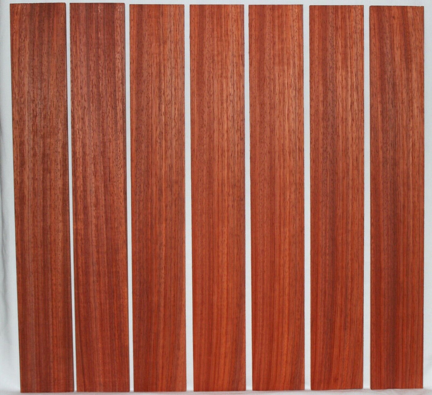Padauk fingerboard blank, quarter sawn 22 X 3 X 0.32 minimum. Sold individually
