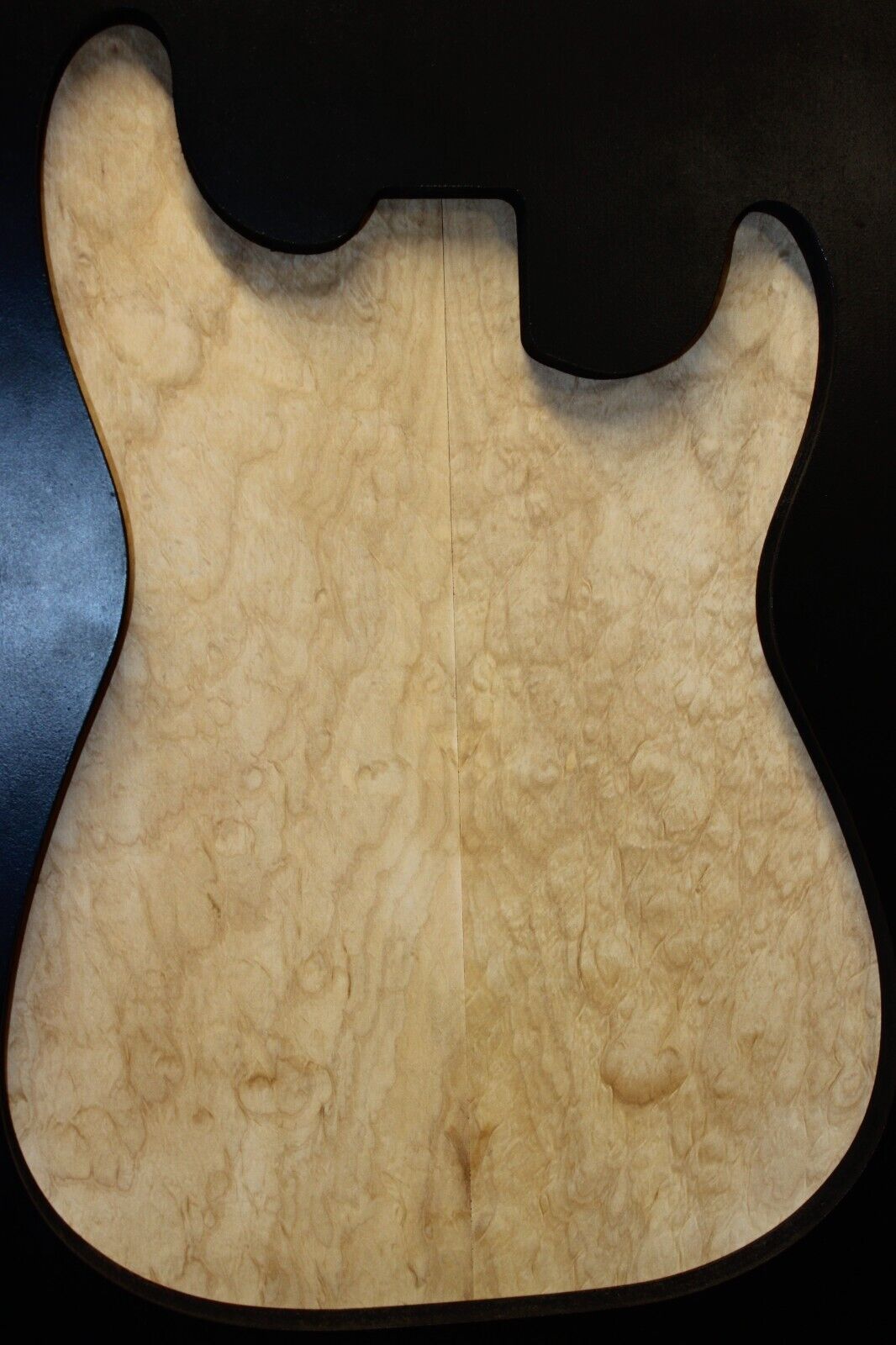 Silver maple, burl / lace figured guitar book matched top.