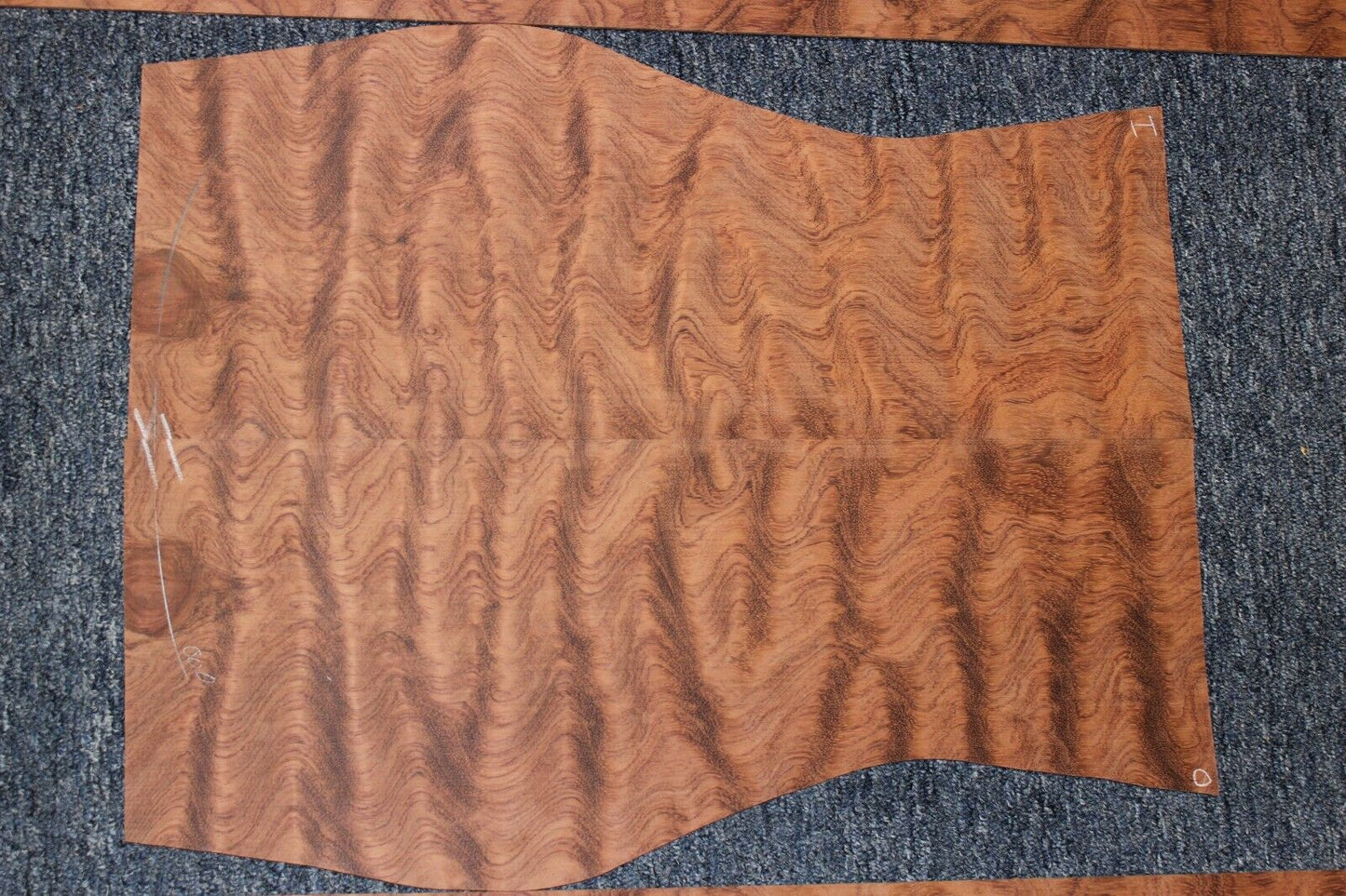 Waterfall figured bubinga back and side set. Stunning grain, color and figure.