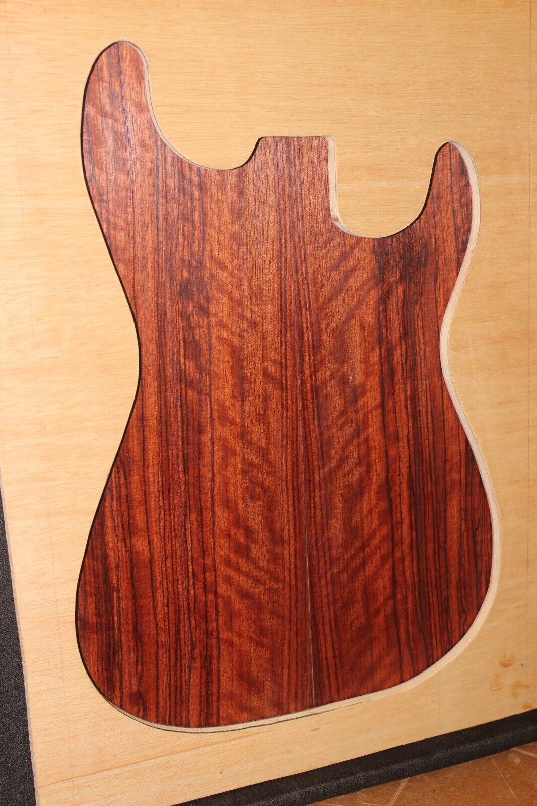 Figured quarter sawn bubinga guitar drop top.