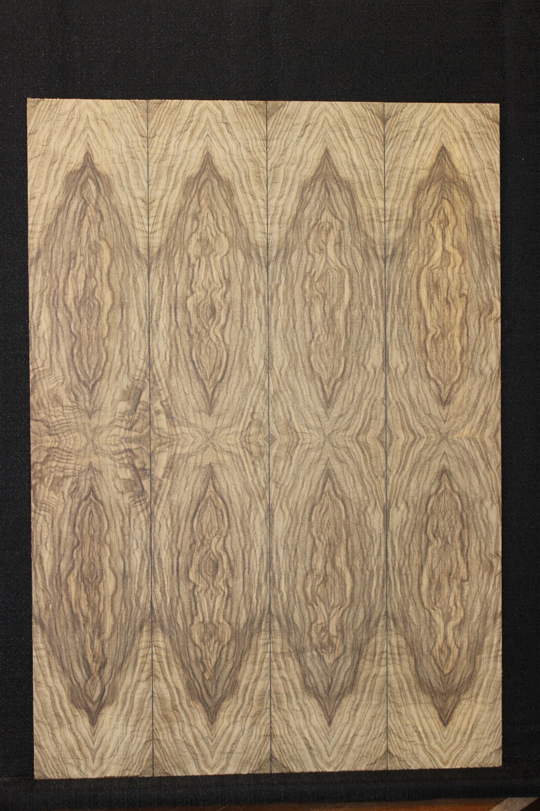 Multi book match black limba END GRAIN electric guitar top.