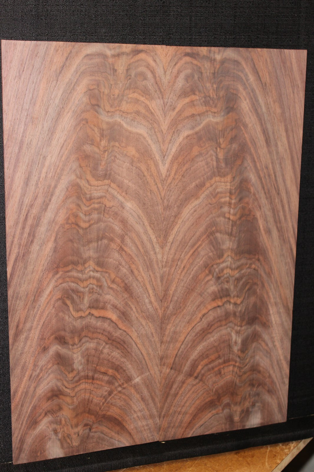 Black walnut crotch figured book matched guitar top.