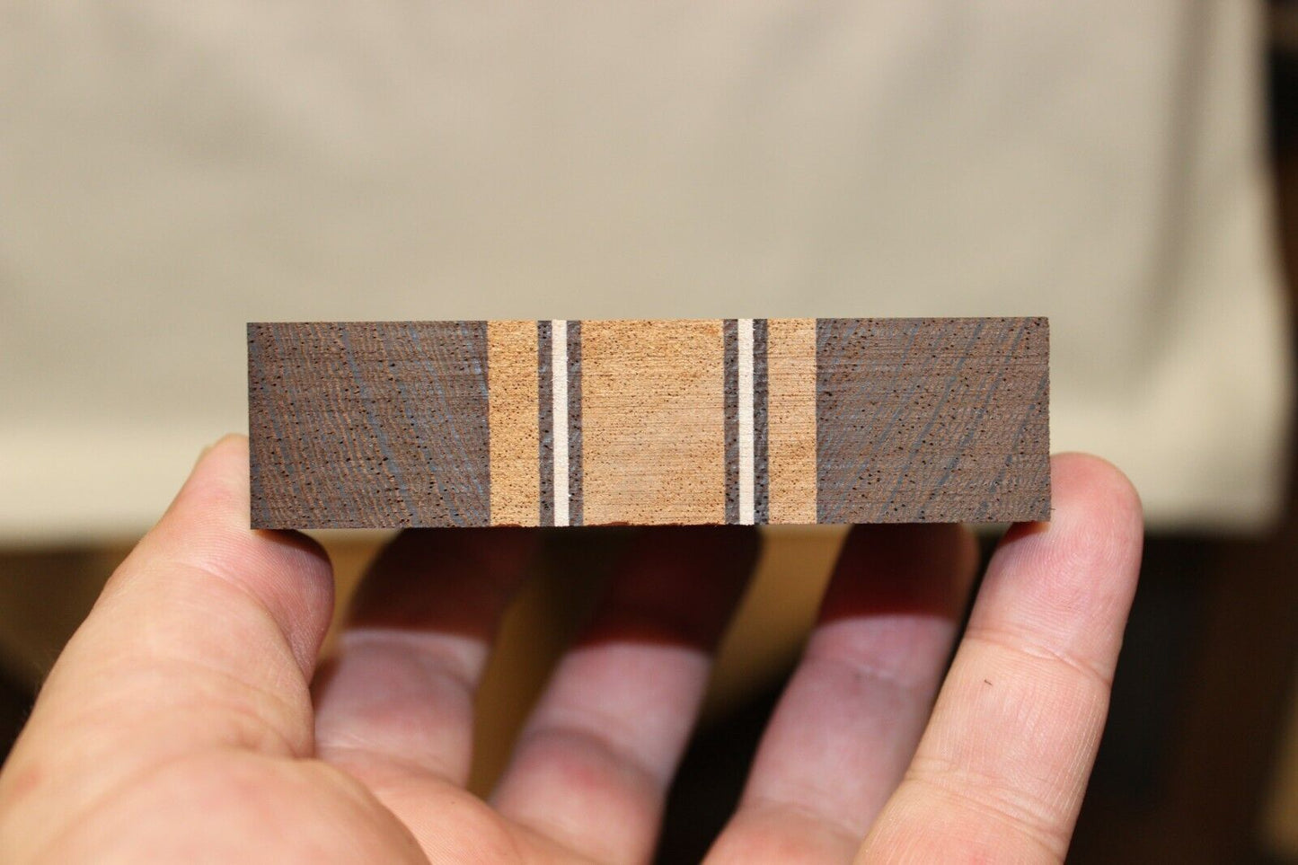 Figured mahogany, wenge and hard maple laminated guitar neck blank.