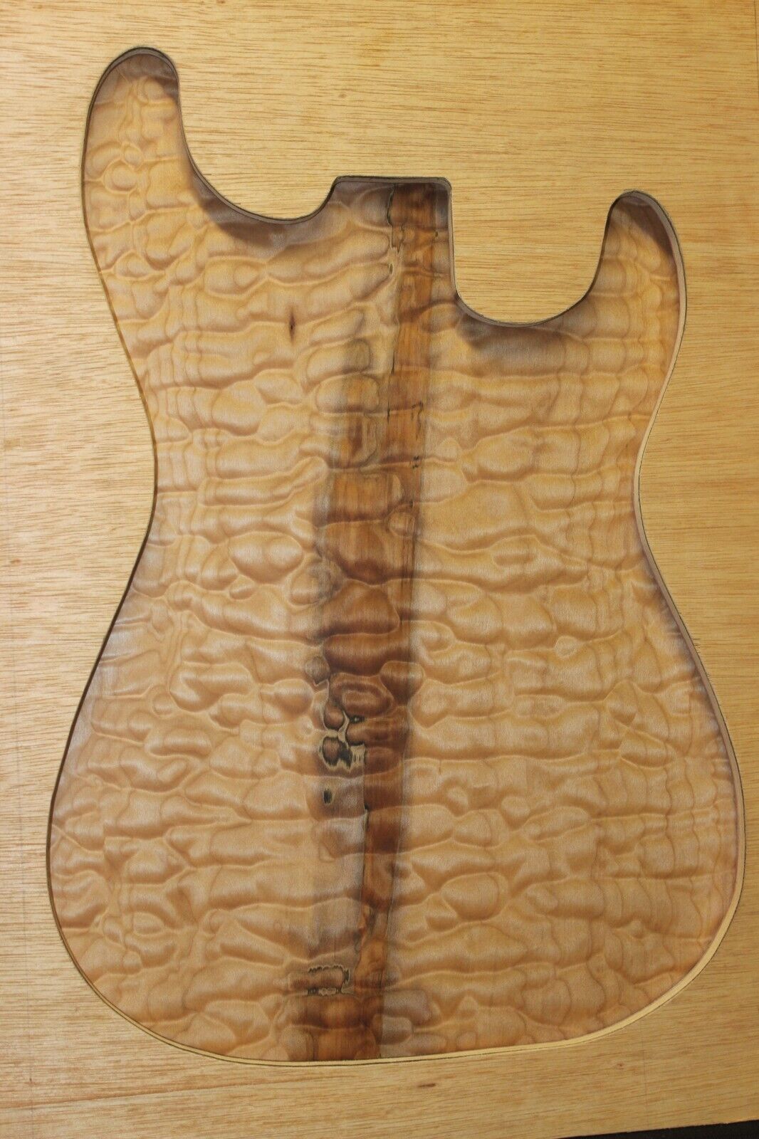One piece quilted maple guitar drop top. 5A figure with flaws