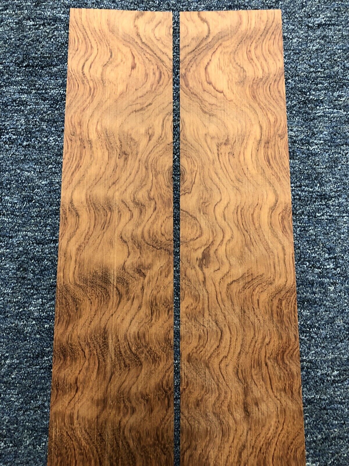 Waterfall figured bubinga back and side set. Stunning grain, color and figure.