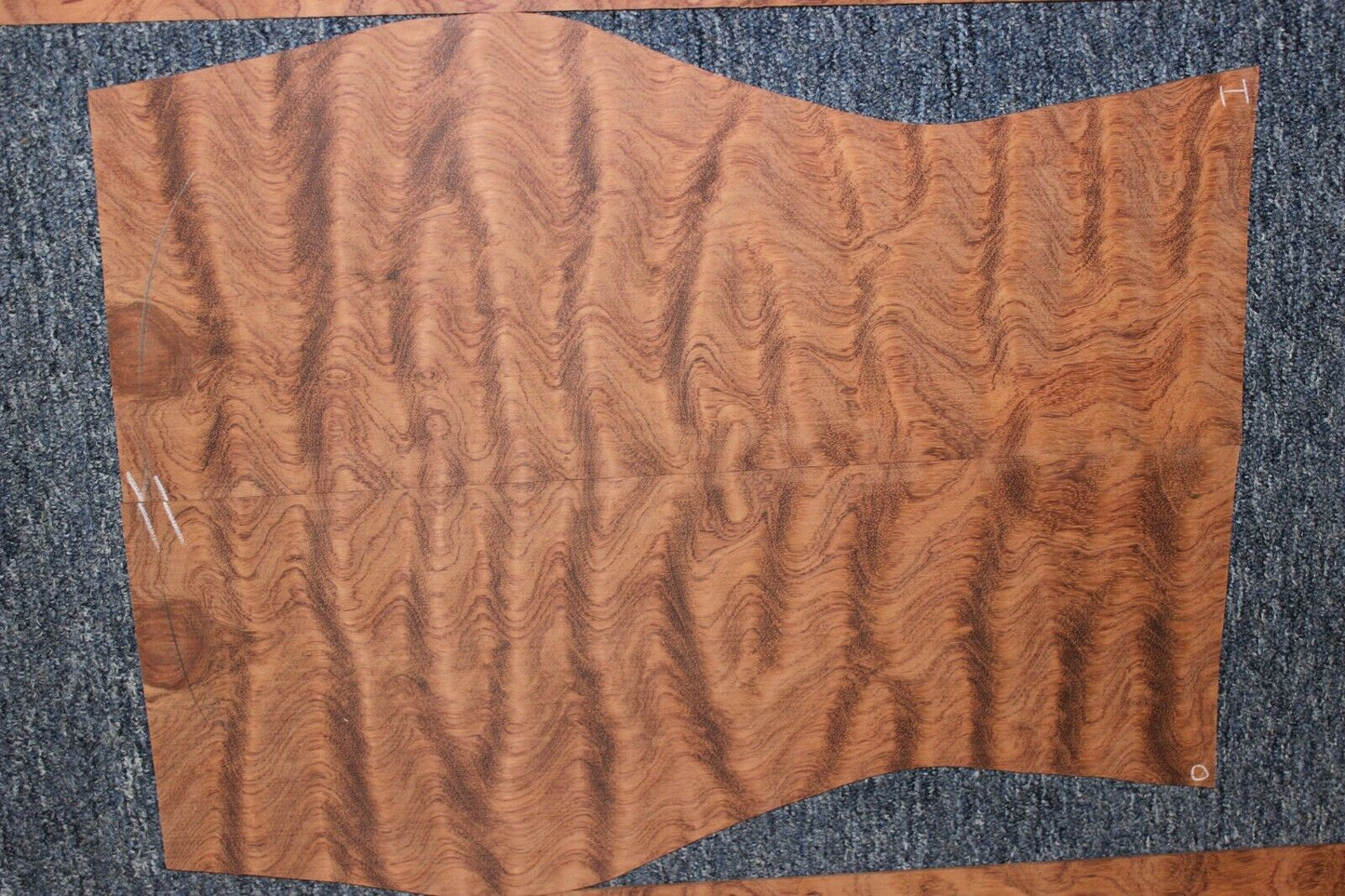 Waterfall figured bubinga back and side set. Stunning grain, color and figure.