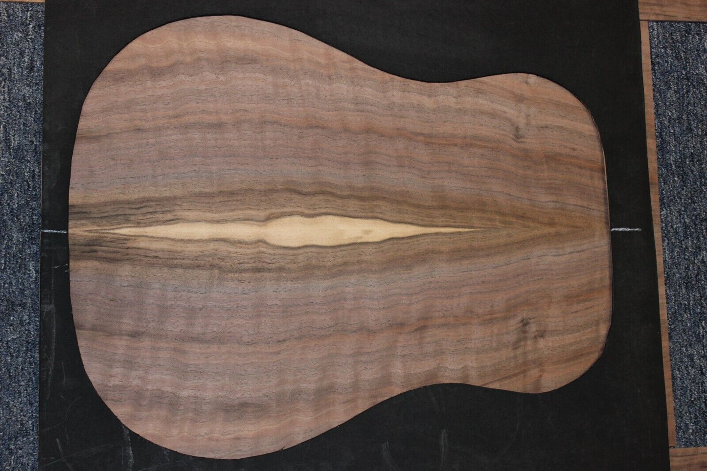 Flame figured black walnut dreadnought size guitar back and side set.