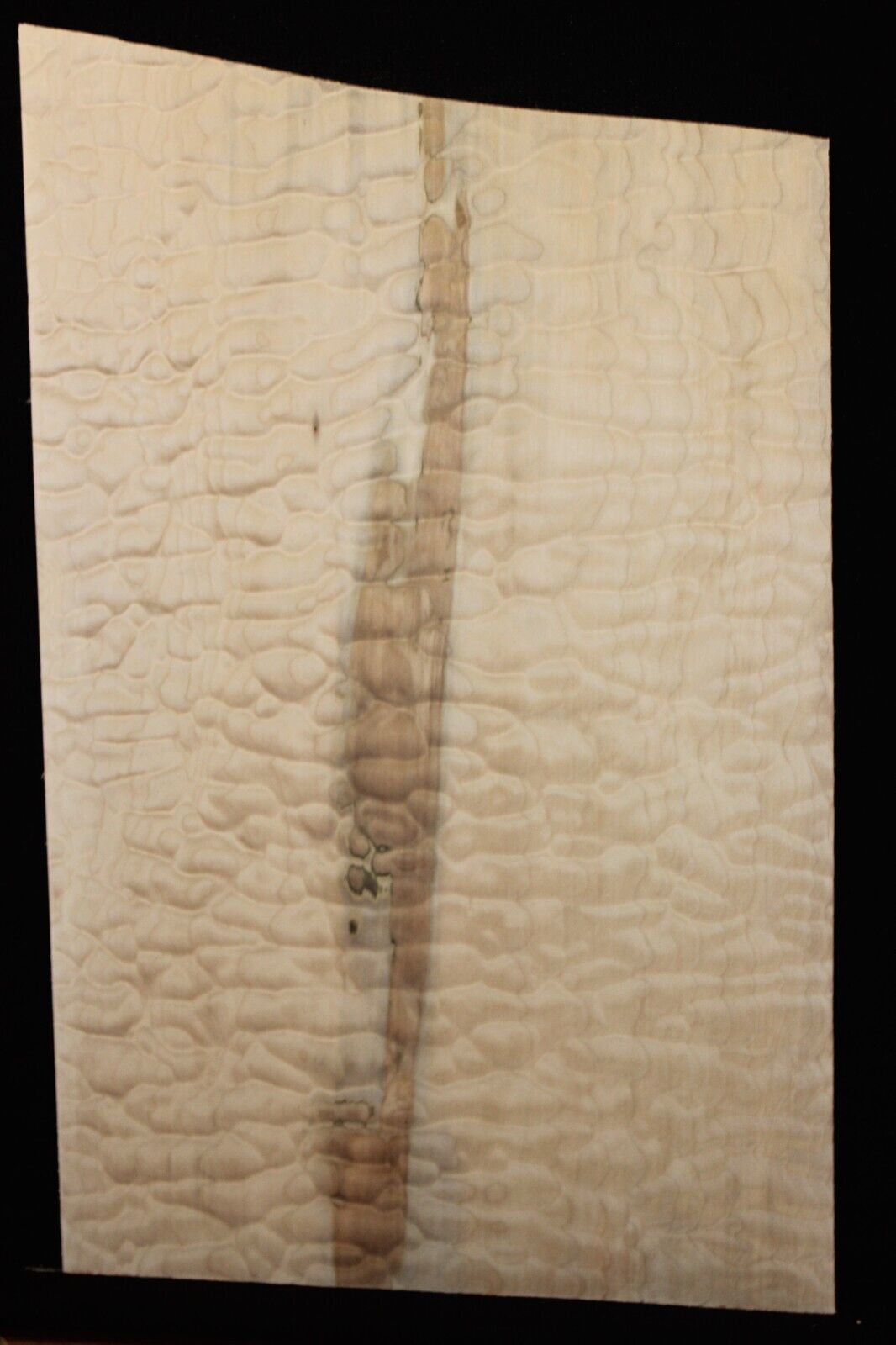 One piece quilted maple guitar drop top. 5A figure with flaws