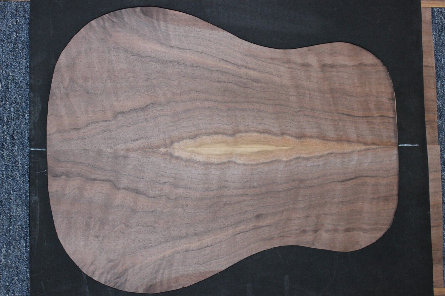 Flame figured black walnut dreadnought size guitar back and side set.