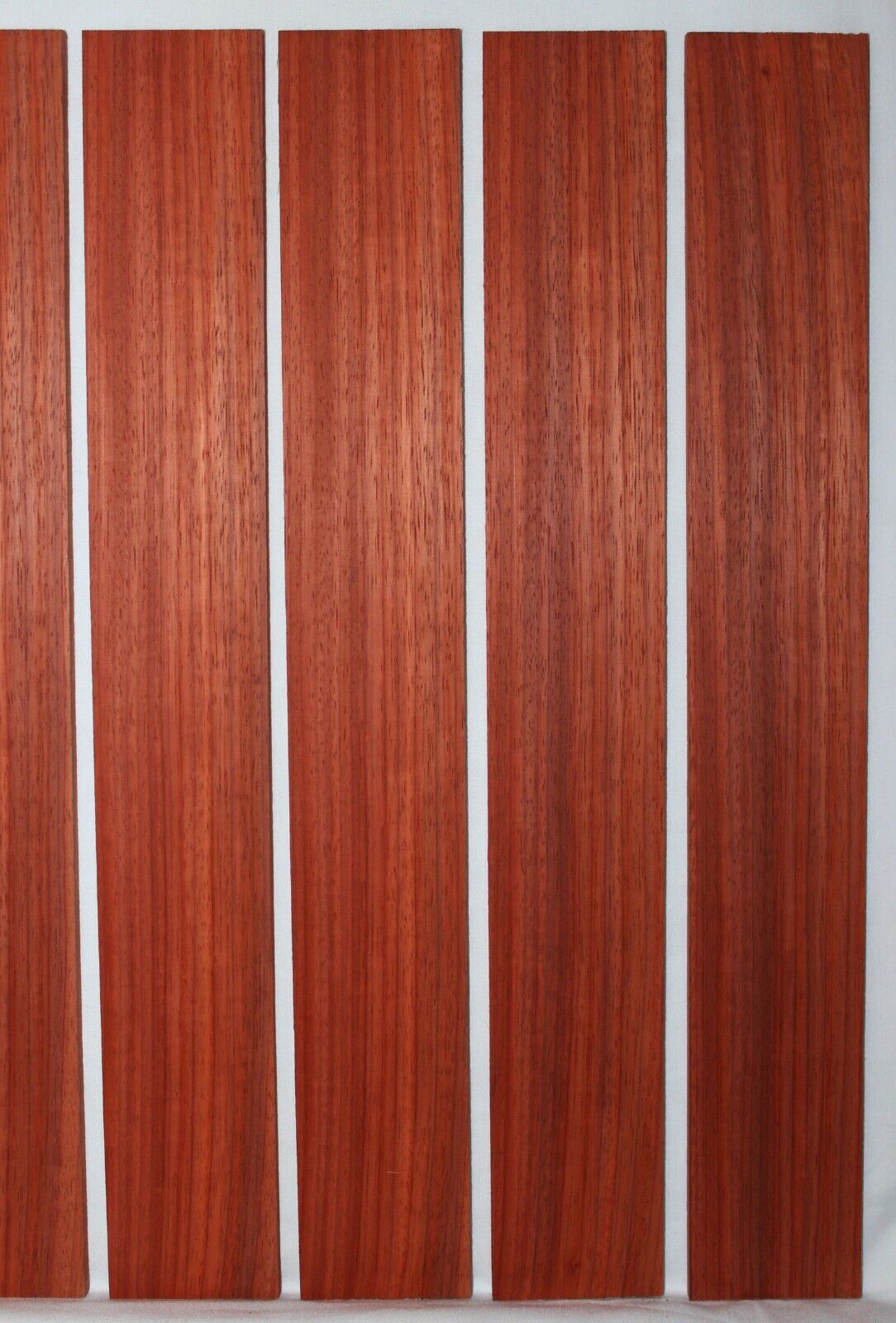Padauk fingerboard blank, quarter sawn 22 X 3 X 0.32 minimum. Sold individually