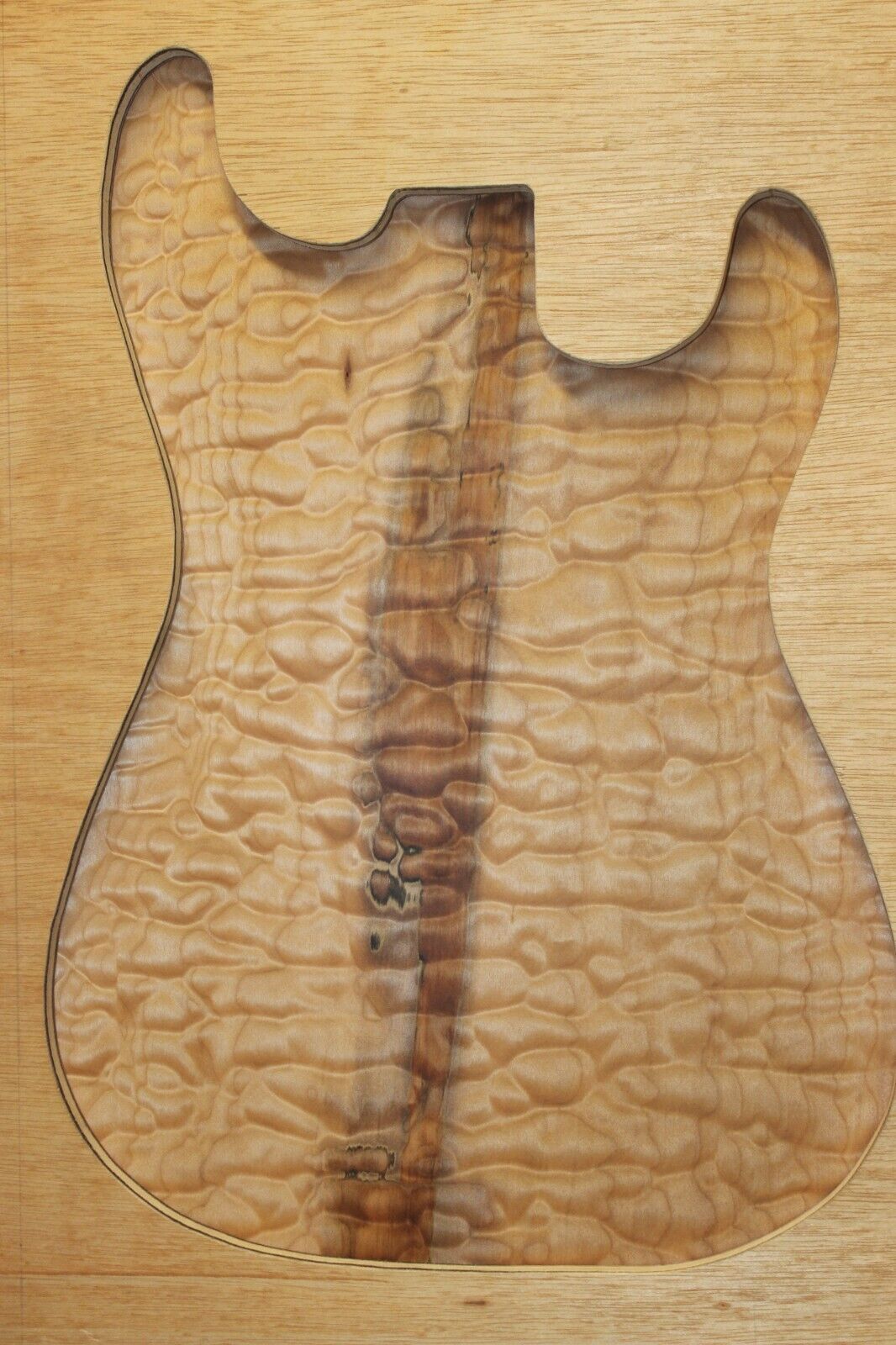 One piece quilted maple guitar drop top. 5A figure with flaws