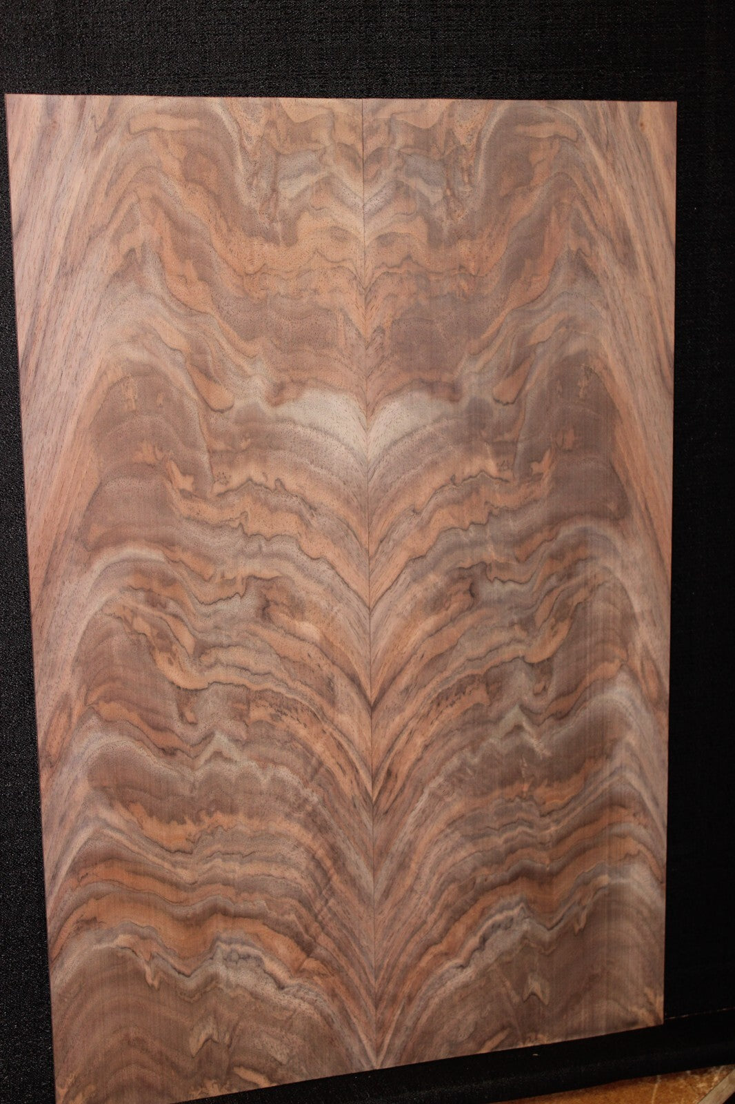 Black walnut crotch figured book matched guitar top.