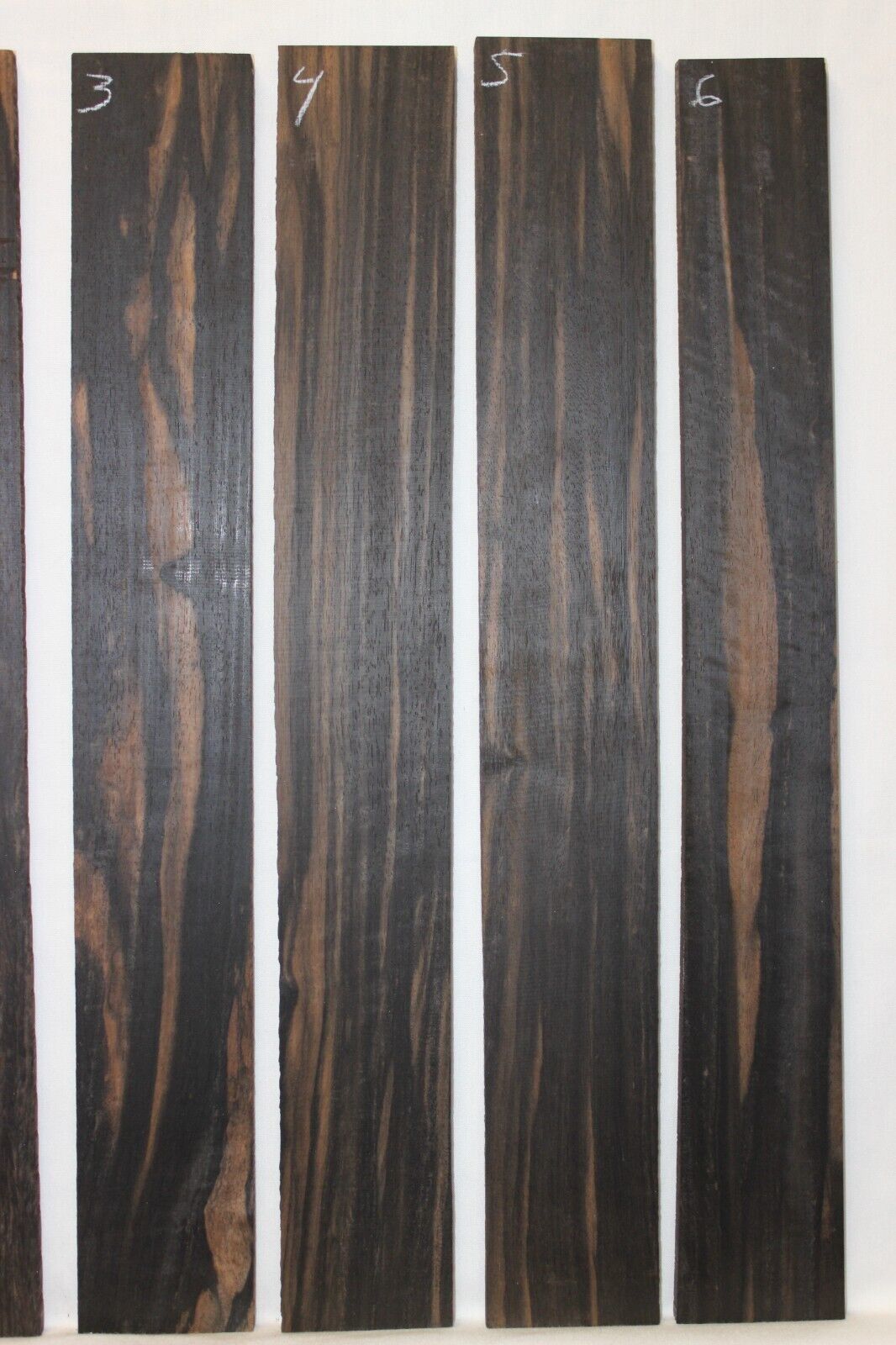 Gaboon ebony guitar fingerboard blanks. Wild color, pale moon ebony like look.