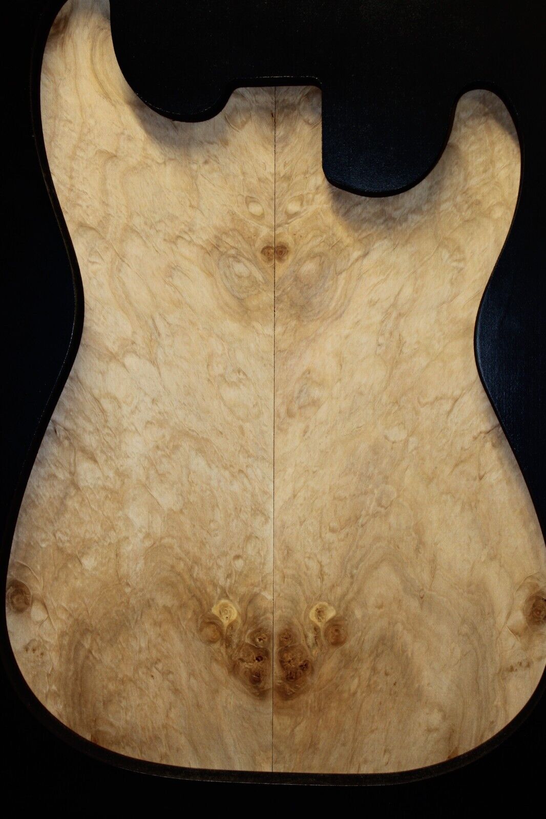 Silver maple, burl / lace figured guitar book matched top.