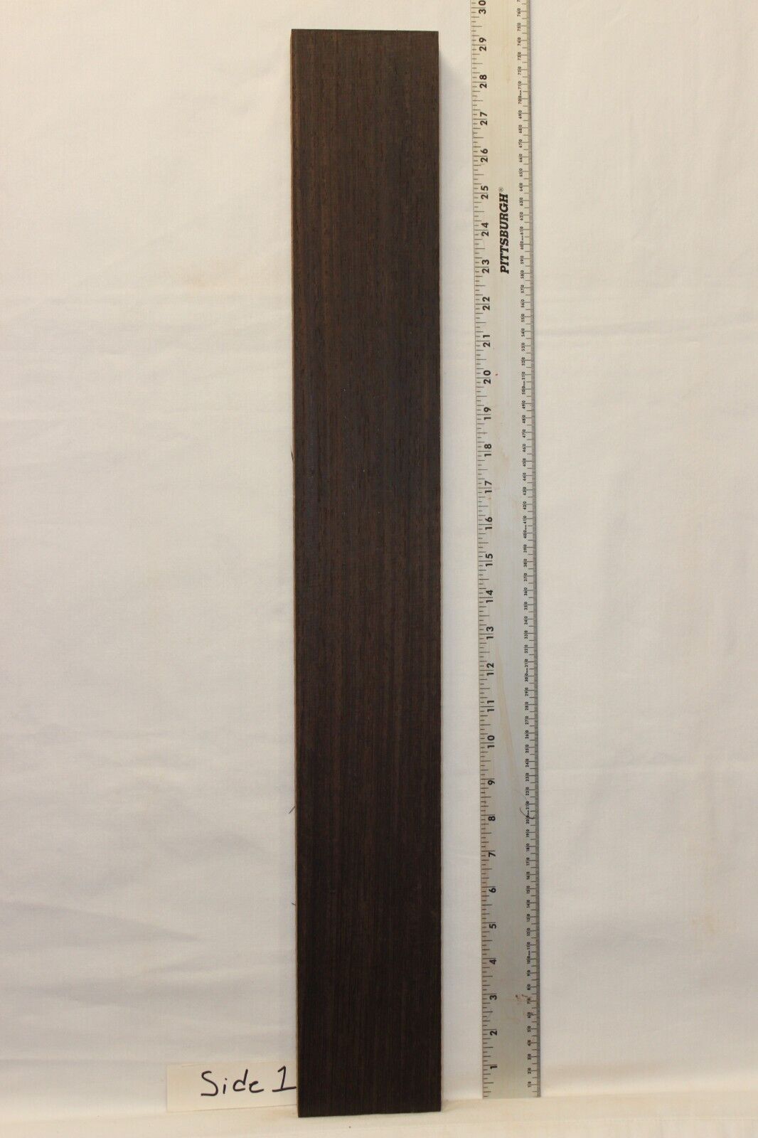 Wenge guitar neck blank. Nice straight vertical grain.