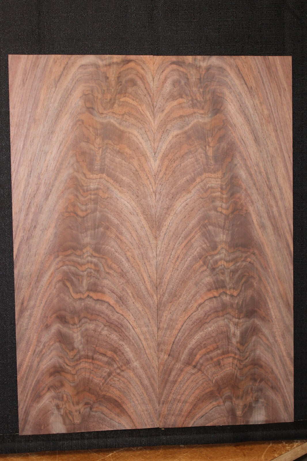 Black walnut crotch figured book matched guitar top.