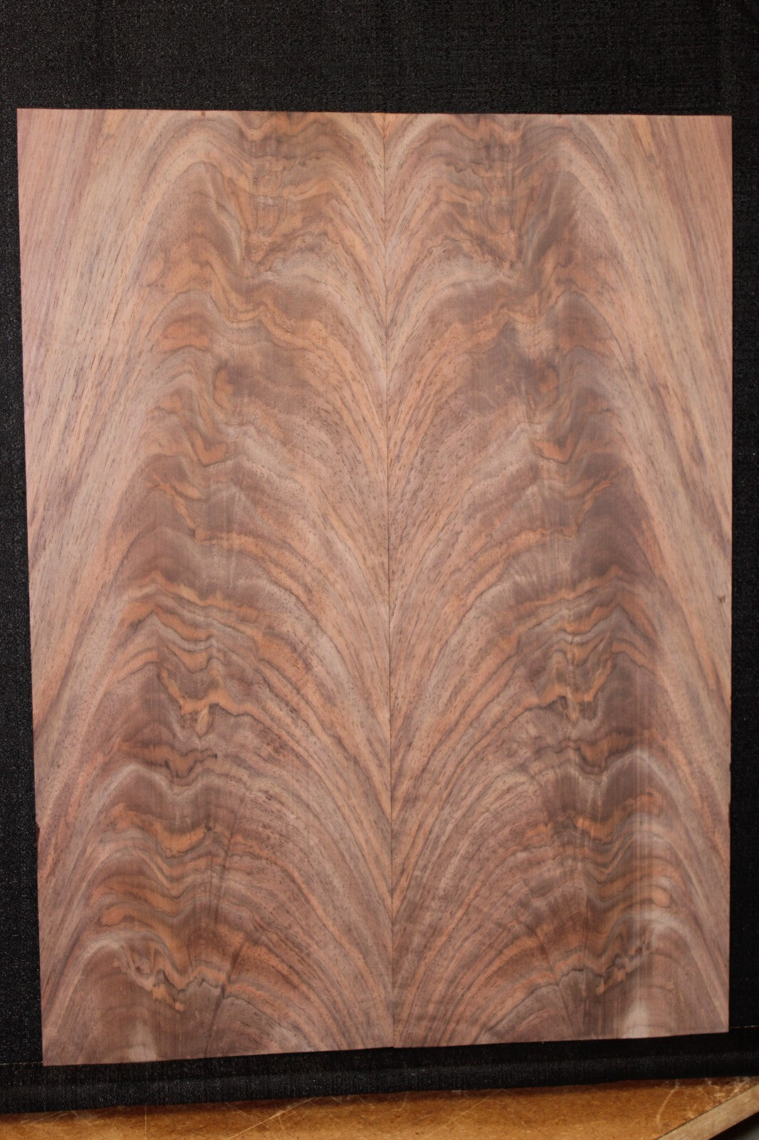 Black walnut crotch figured book matched guitar top.