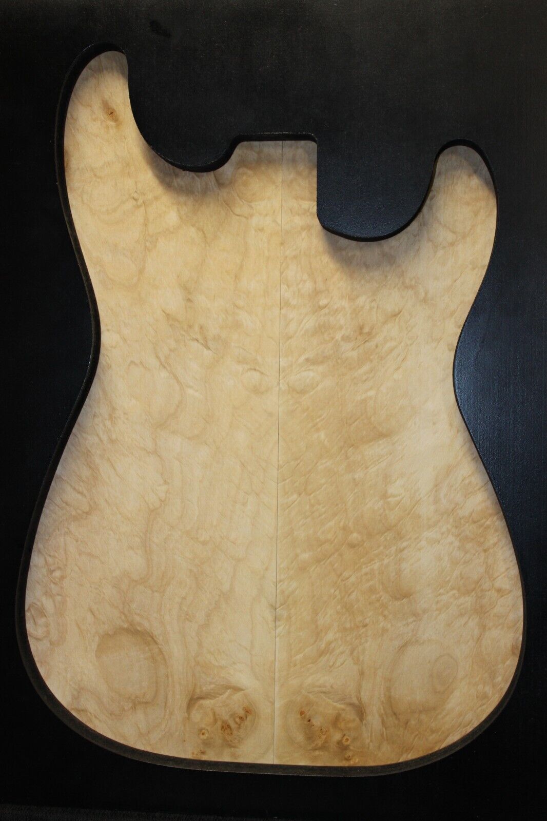 Silver maple, burl / lace figured guitar book matched top.