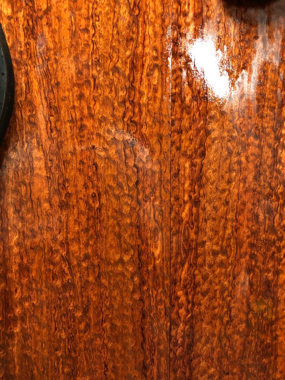 Pomelle figured bubinga electric guitar drop top.