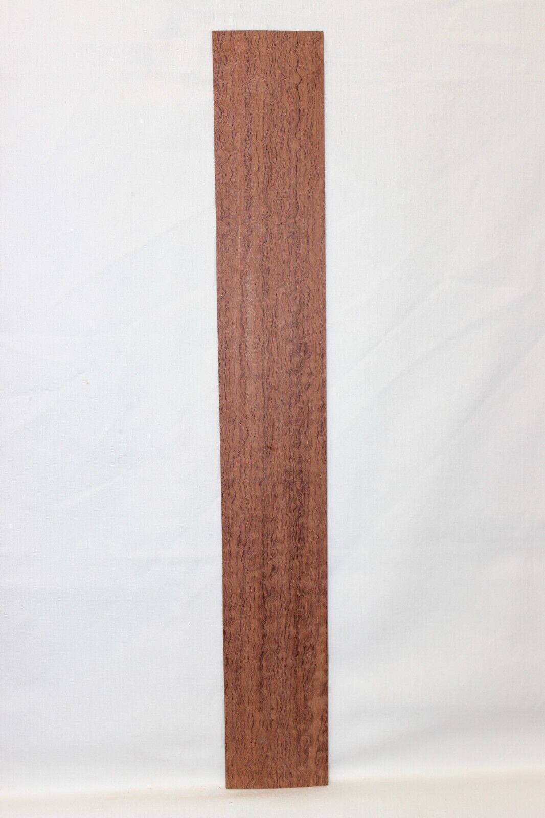 12 inch radius figured bubinga guitar fingerboard blank.