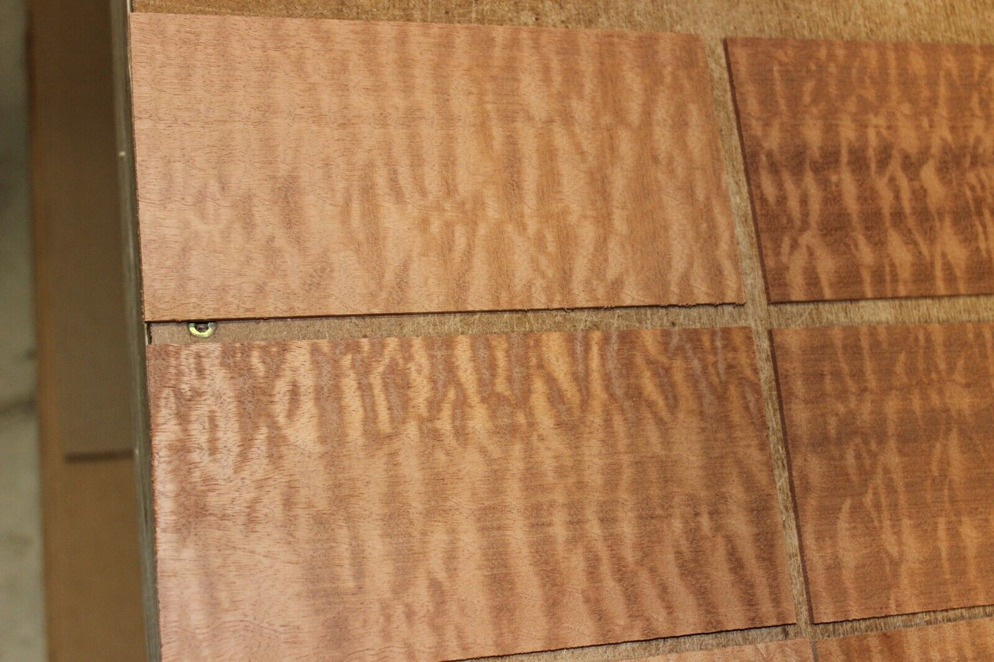 quilted figured sapele headstock / peg head veneer. Sold individually