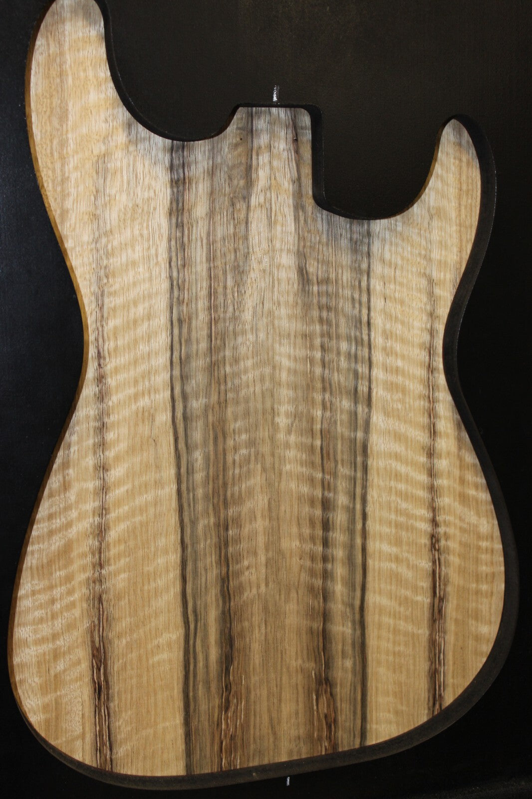Curly black limba / korina figured book matched guitar top. 0.37" thick