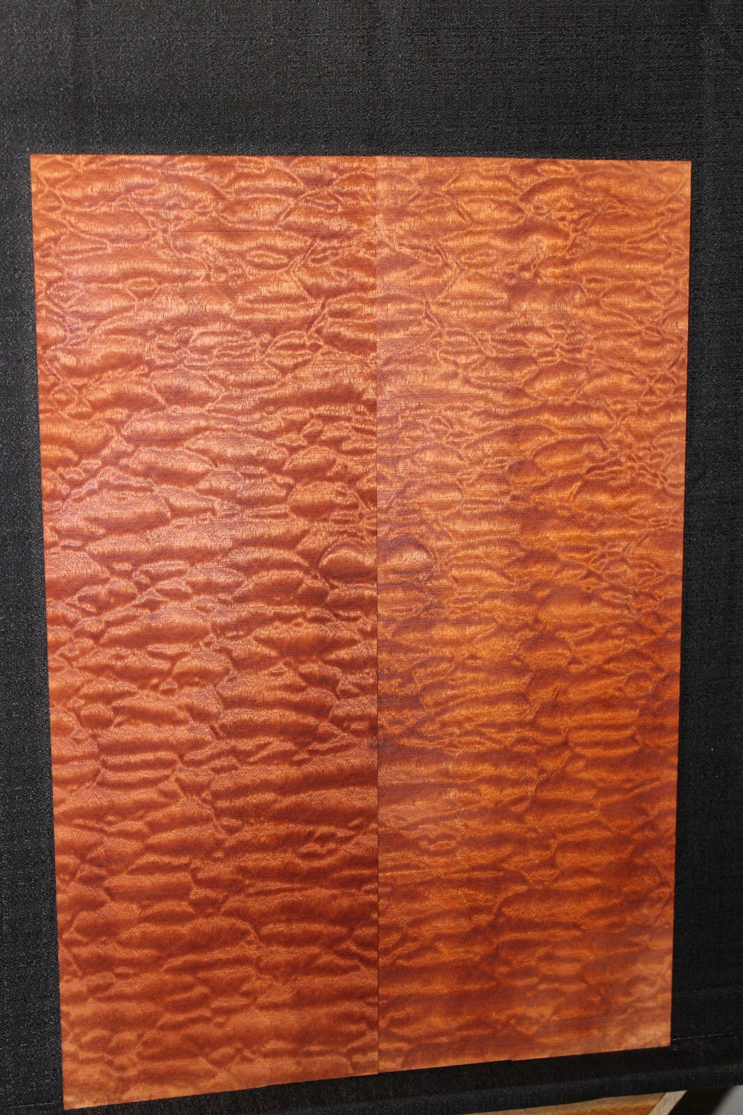 Quilted sapele electric guitar bookmatched drop top. Master grade figure.