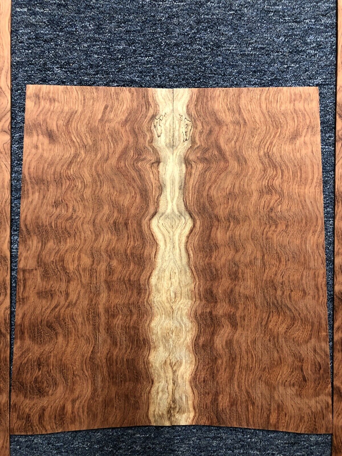 Waterfall figured bubinga back and side set. Stunning grain, color and figure.