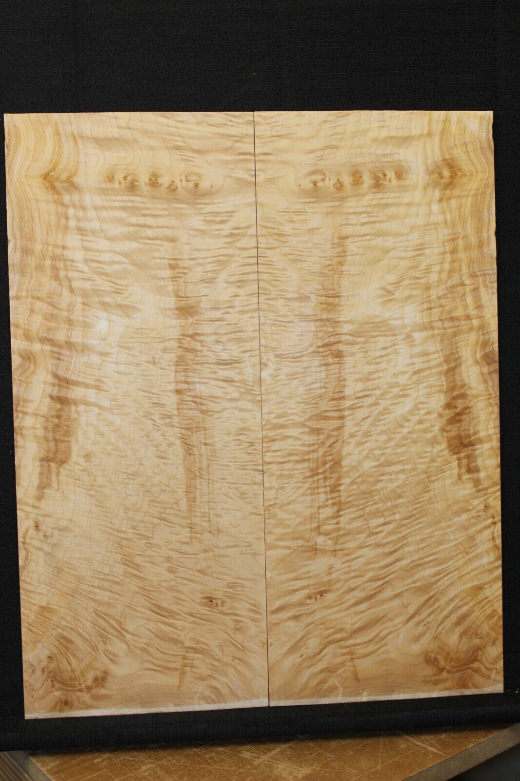 Quilted maple guitar drop top. Nice figure/with minor flaws.