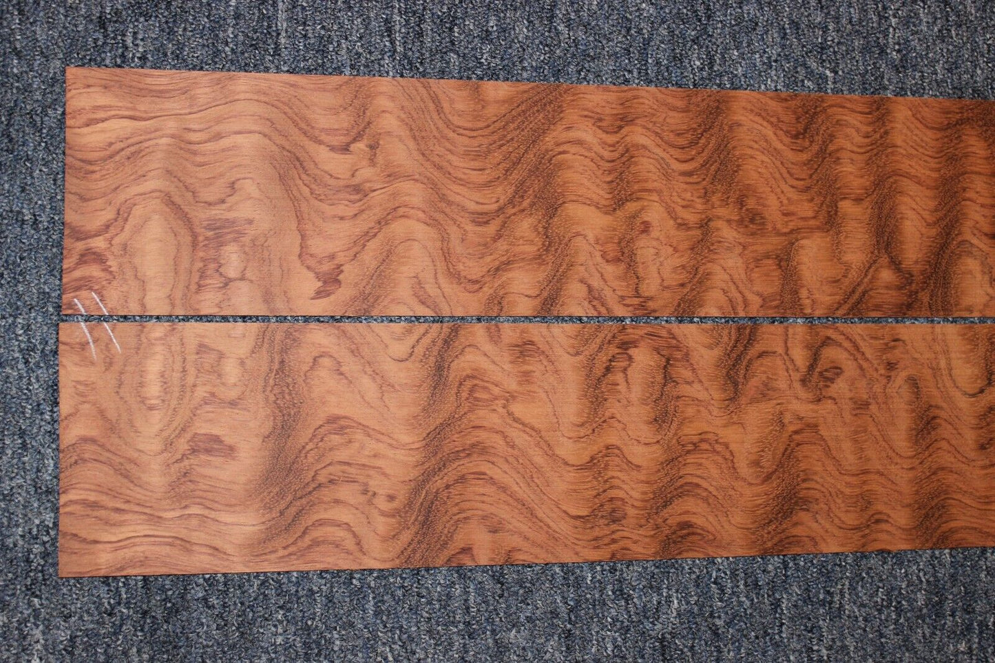 Waterfall figured bubinga back and side set. Stunning grain, color and figure.