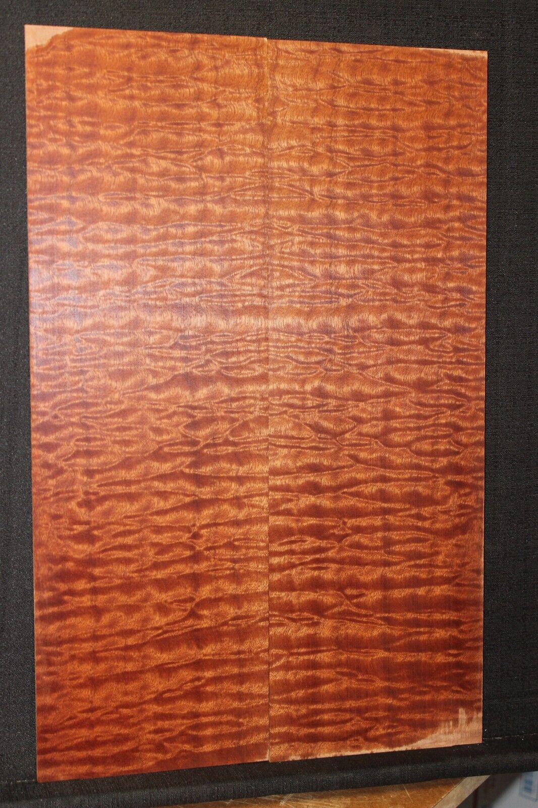 Quilted sapele electric guitar bookmatched drop top. Master grade figure.