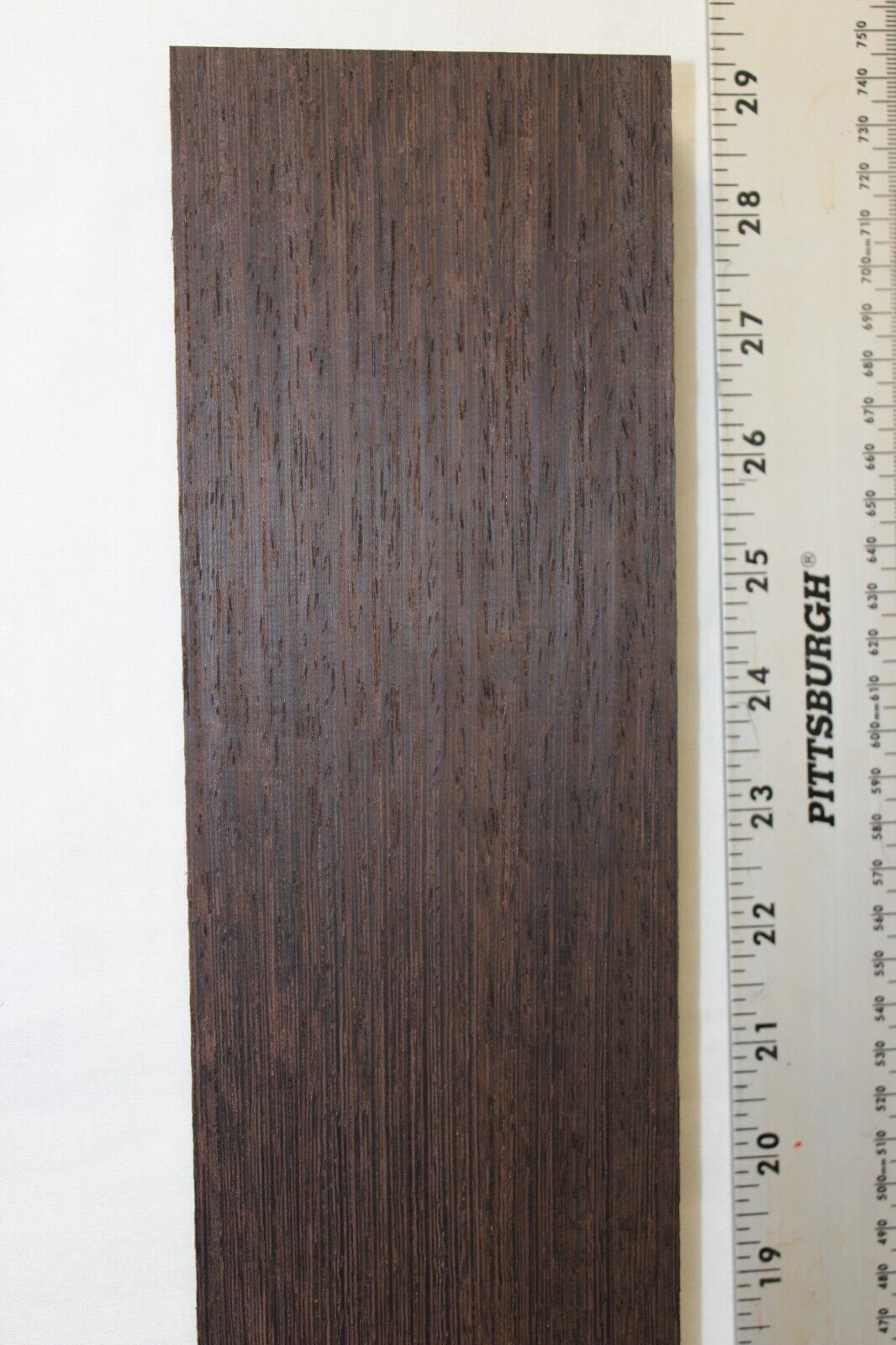 Wenge guitar neck blank. Nice straight vertical grain.
