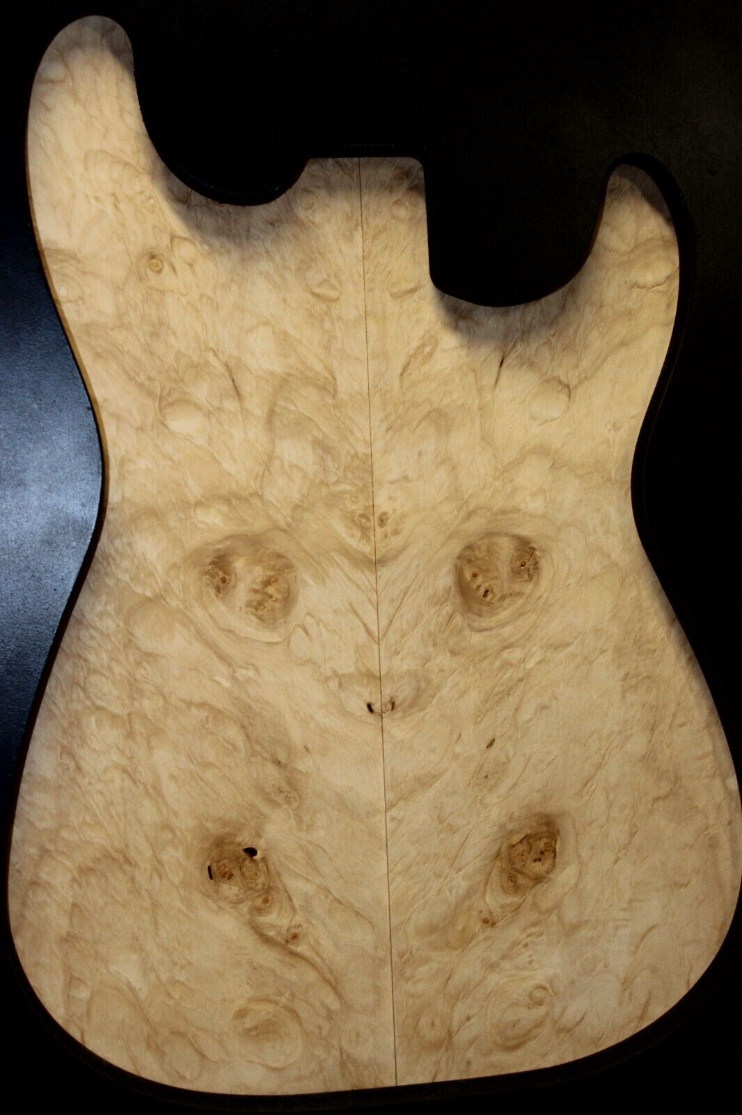Silver maple, burl / lace figured guitar book matched top.