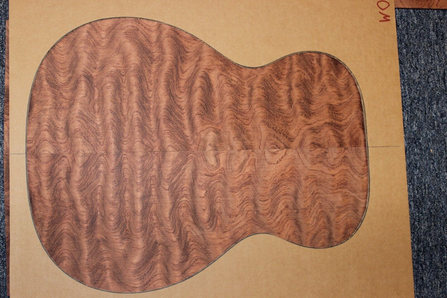 Waterfall figured bubinga back and side set. Stunning grain, color and figure.
